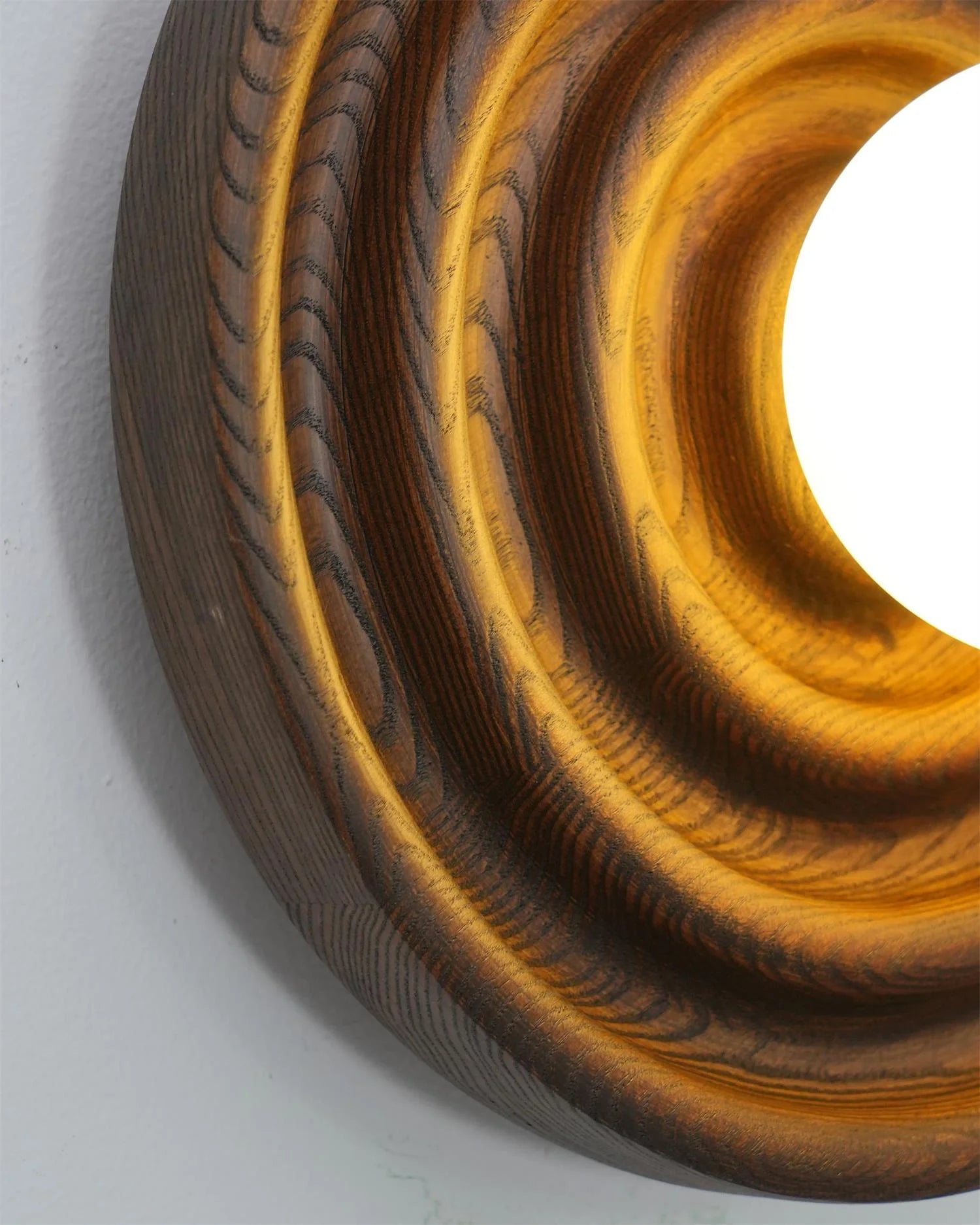 Zenviae Grove Wall Lamp close-up showing wood texture lit
