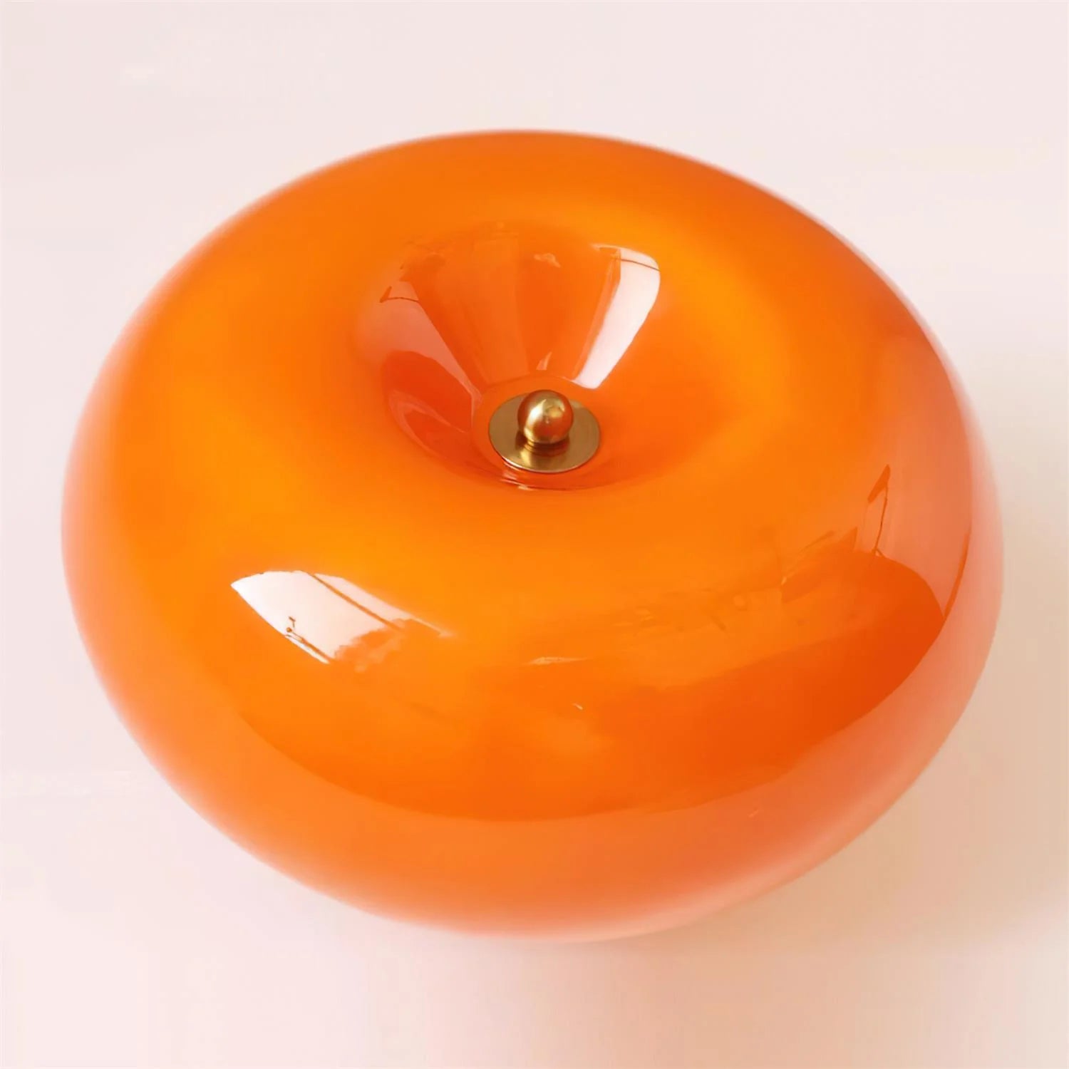 Zenviae Sunny Donut Wall Lamp close-up showing amber glass